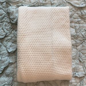 SnuggleMe Organic’s puddle pad cover